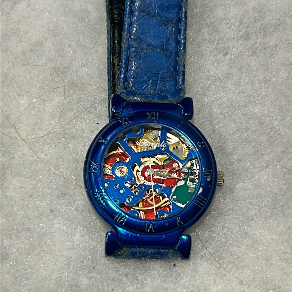 Vintage Blue and Gold Women's Watch with Skeleton Dial